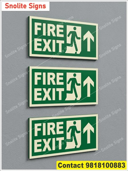 High-Quality Green Emergency Fire Exit Signs Featuring the Running Man Icon and an Upward Arrow for Building Safety compliance. Buy Radium Heavy-Duty Acrylic Fire Exit Route Sign Board in Hindi & English, Night Glow Illuminated Fire Exit Signs Near Me